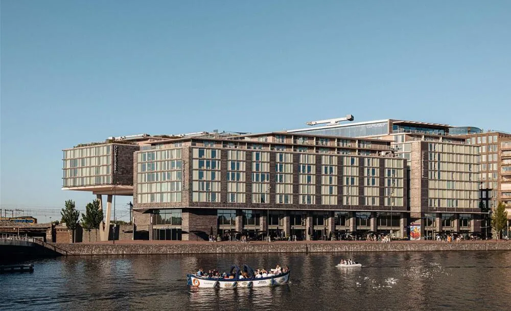 Waterfront exterior of DoubleTree by Hilton Amsterdam Centraal Station